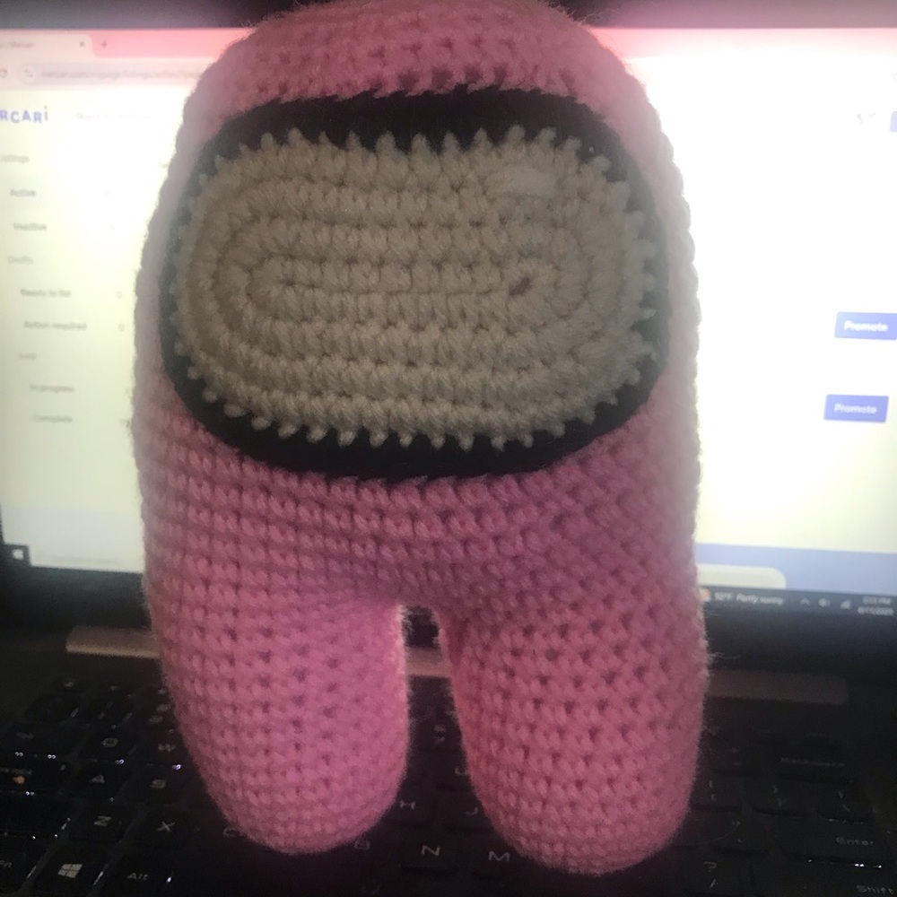 Pink and Black Stuffed Toy